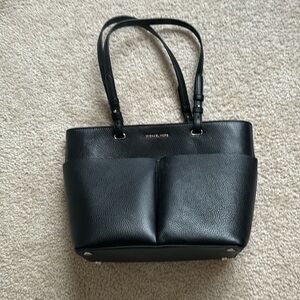 Michael Kors leather tote. Black with silver accents. Lots of pockets!